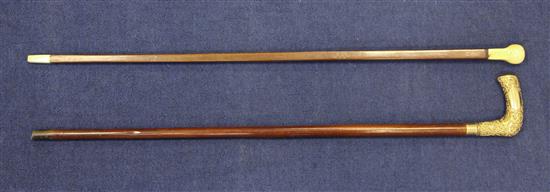 A 19th ivory handled square section walking cane & another